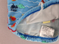 Preview: Badehose Gr. 92/98 Jako-o hellblau mit bunten Fischen Kordelzug