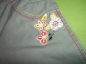 Preview: Sommerjeans Gr. 74/80 Topolino oliv mit Blumenstickerei