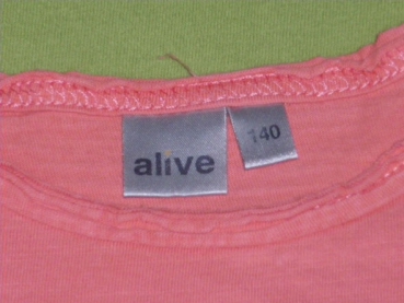 T-Shirt Gr. 116 Aldi orange mit bunten Gesichern