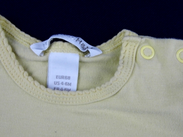 Stretchshirt Gr. 62 H&M cremegelb mit Hündchen