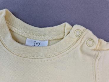 Langarmshirt Gr. 56/62 cremegelb mit Krone