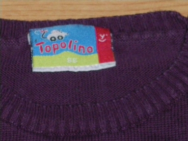 Strickpulli Gr. 80 Topolino lila mit Bindeband