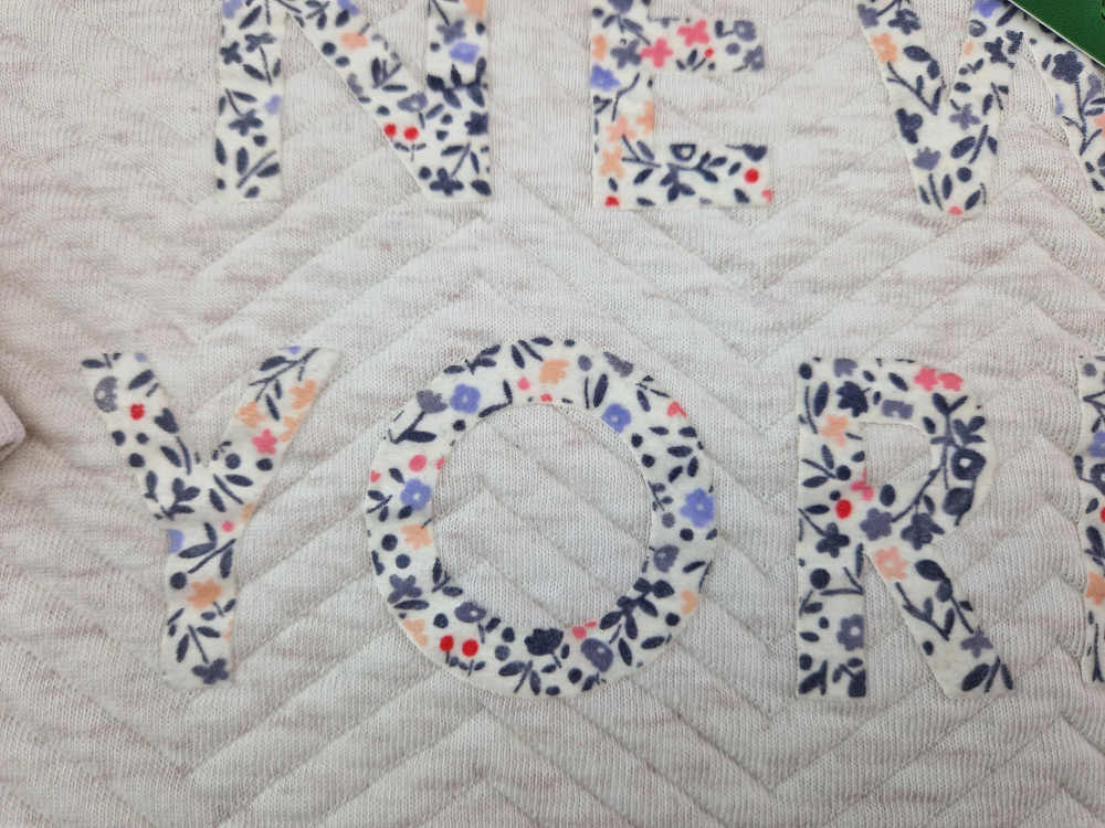 wattiertes Langarmshirt Gr. 74 H&M weiß/altrosa New York