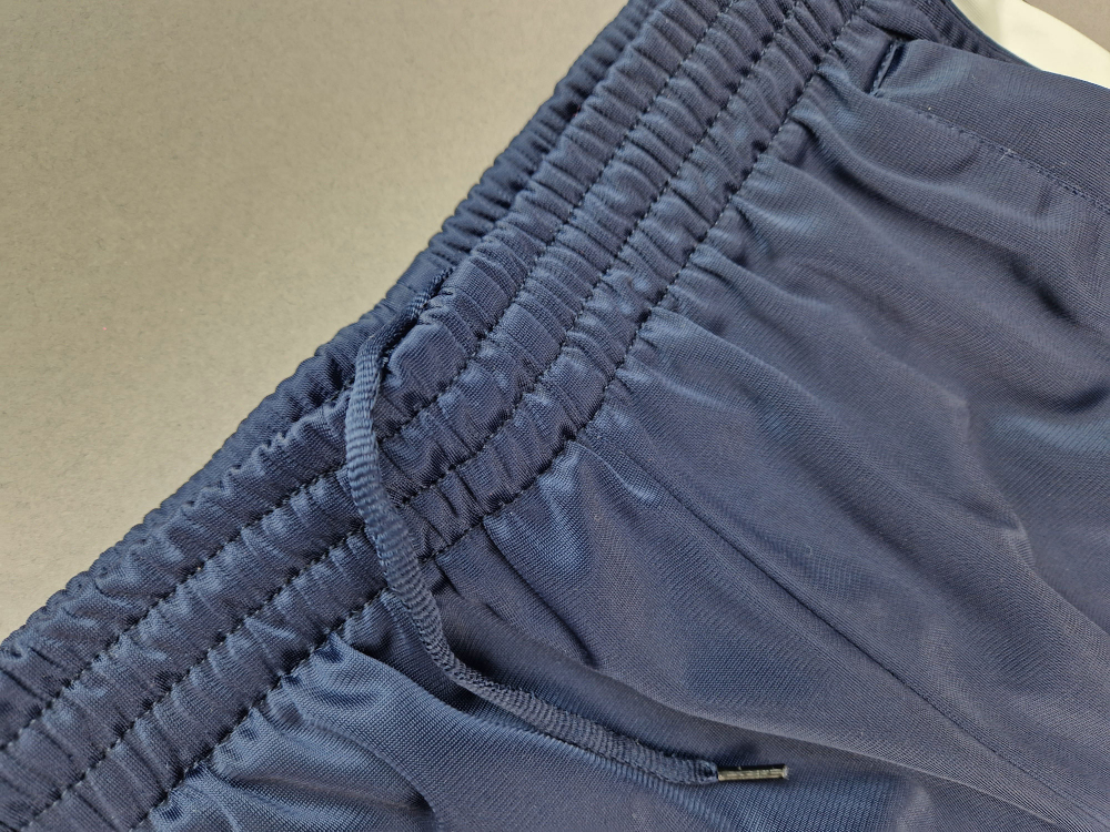 Sporthose Gr. 122 dunkelblau mit weißen Streifen lang