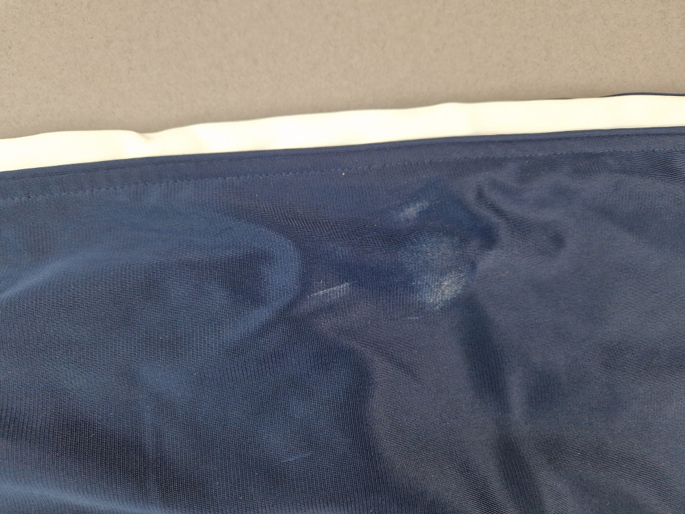 Sporthose Gr. 122 dunkelblau mit weißen Streifen lang