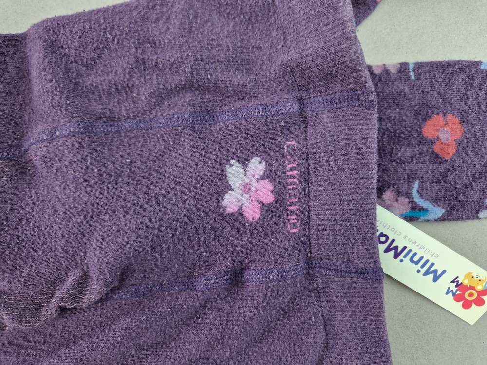 Strumpfhose Gr. 128 lila mit Blümchen