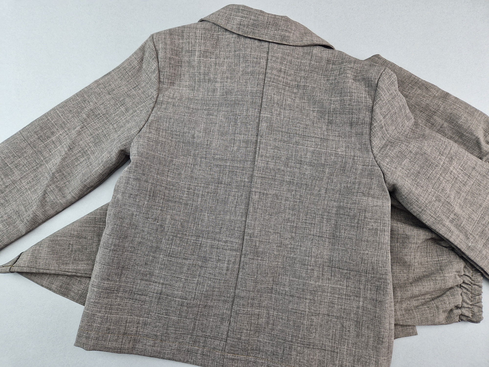 feiner Anzug Gr. 98/104 dunkelbraun meliert 2 teilig