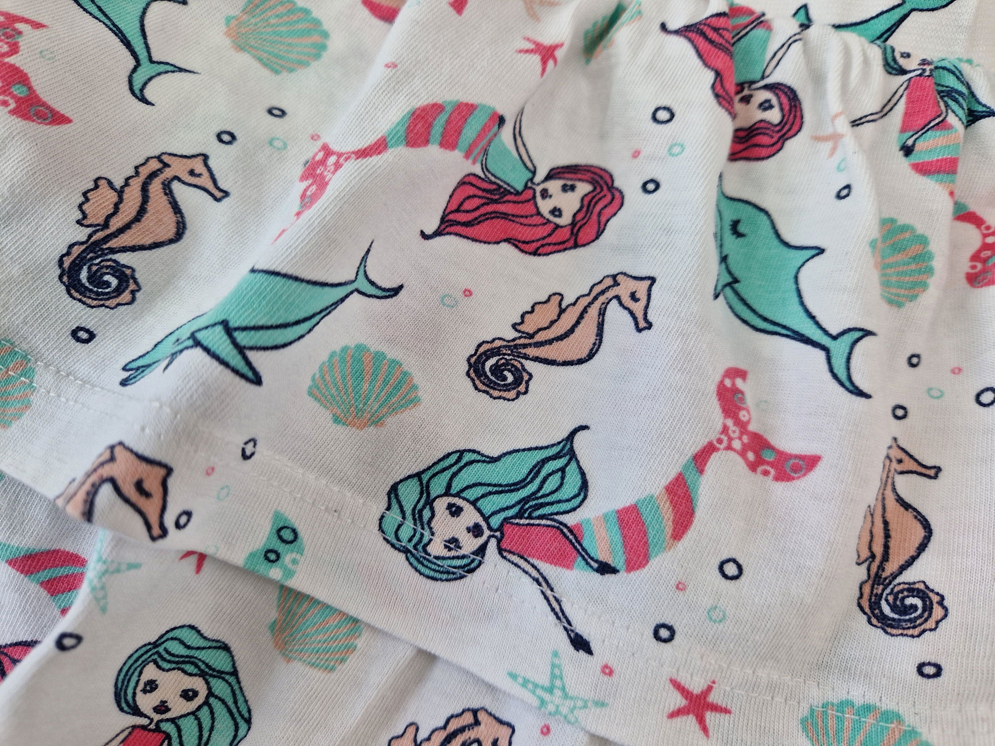 Jerseyröckchen Gr. 116 Volant weiß Seepferdchen Meerjungfrauen