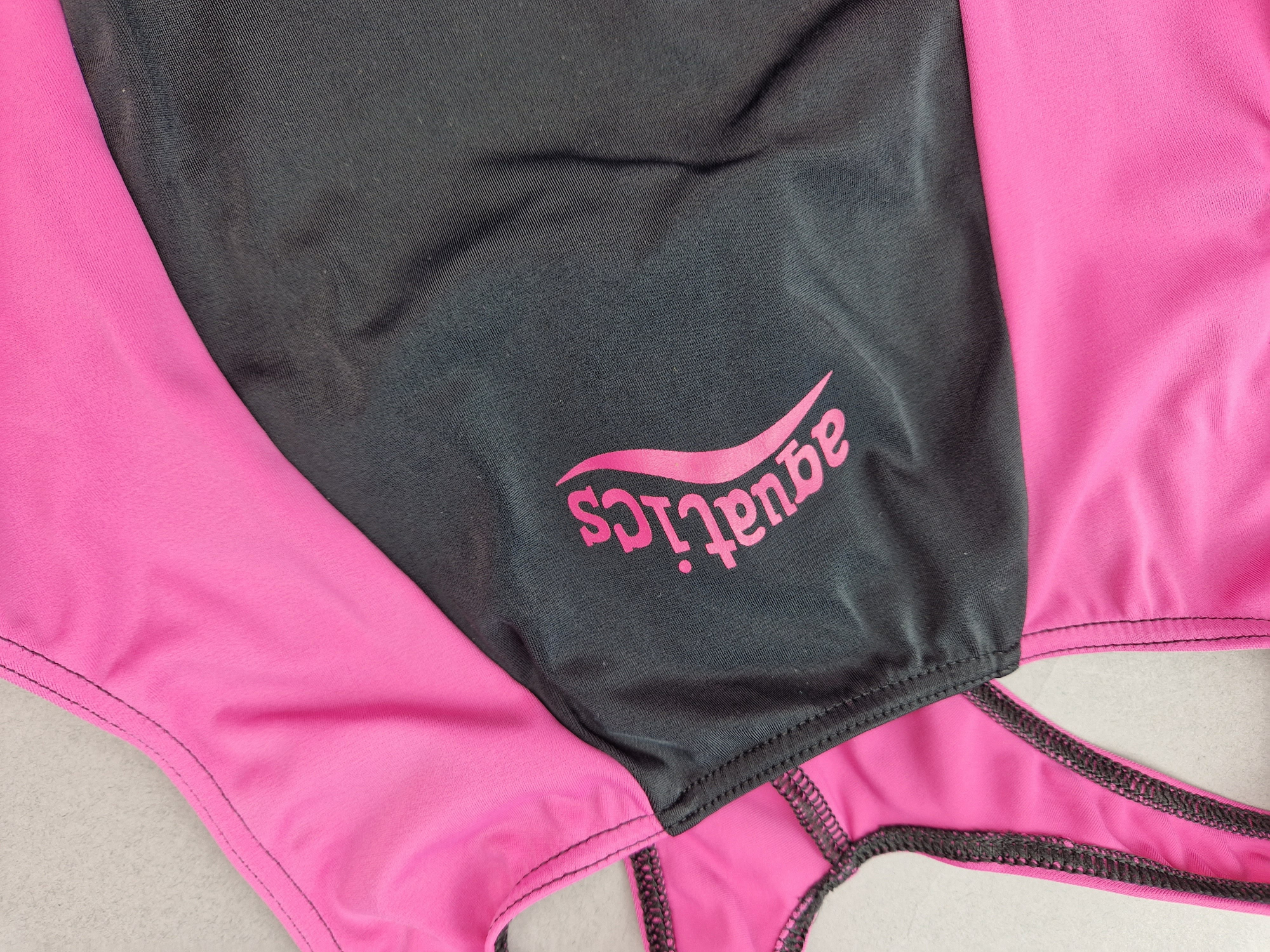 Badeanzug Gr. 152/158 schwarz pink