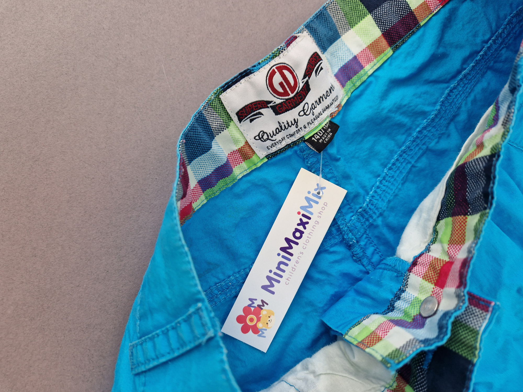 ¾ Sommerhose Gr. 140 Garment türkisblau Blumendruck